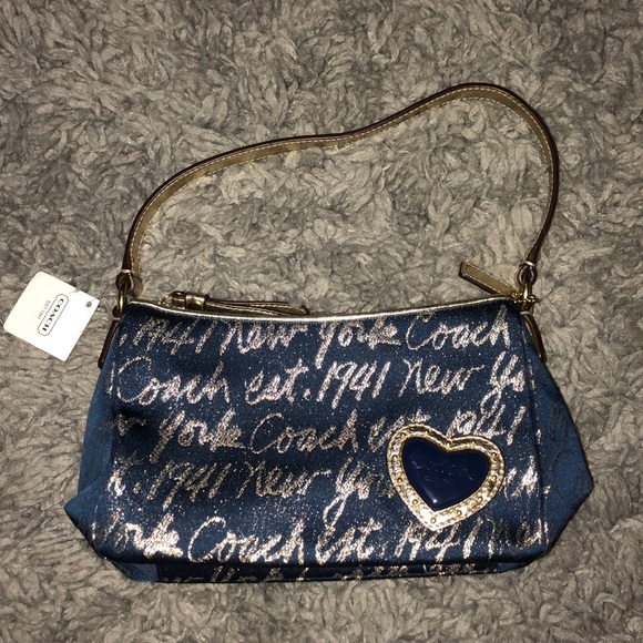 small navy blue coach purse